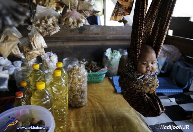 عکس دیدنی از نحوه نگهداری بچه