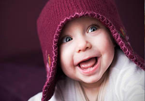 ﻿  دانشمندان دلیل لبخند زدن نوزادان را کشف کردند